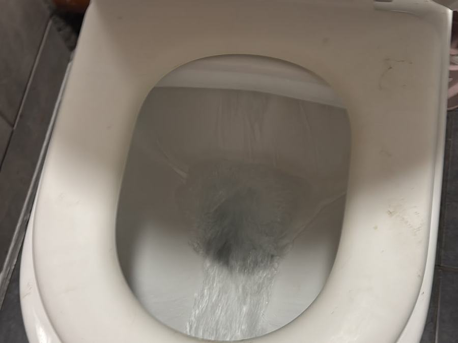 Toilet flushing clear after a blockage was removed